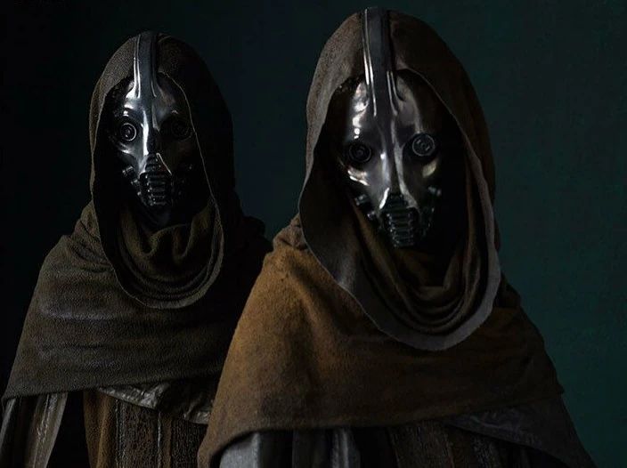 Tunda Ress (Masked Figure)